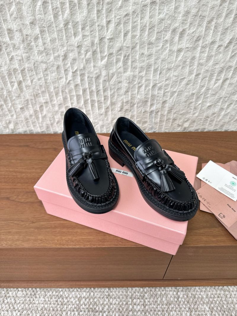 Miu Miu Tassel Loafers in Polished Leather 5D497E Black