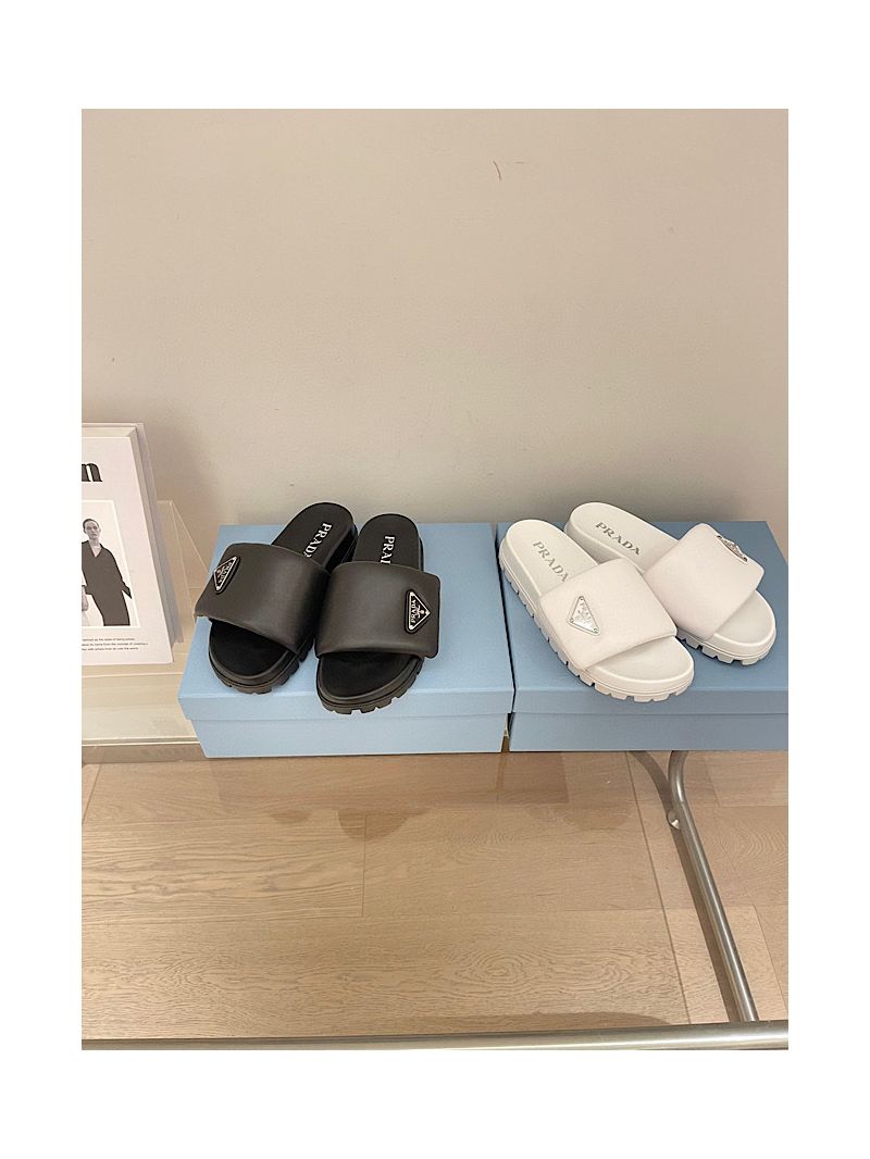 Prada Soft padded nappa leather slides 1XX648