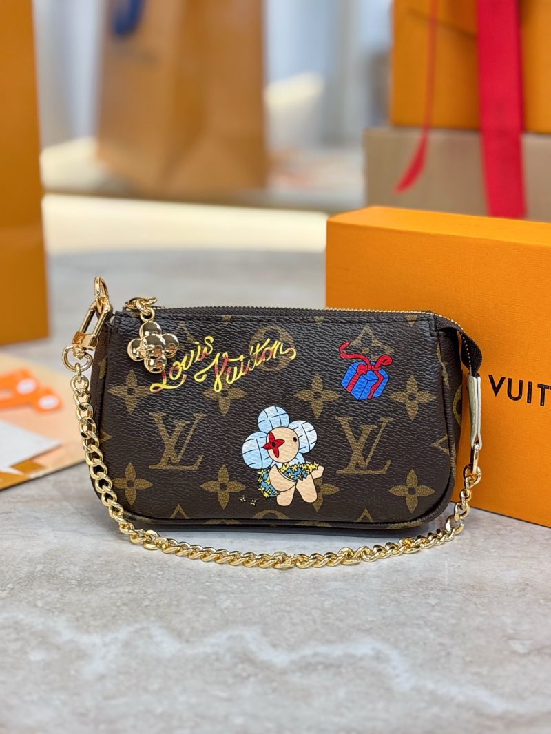 Louis Vuitton Mini Pochette Accessoires in Monogram Canvas Brown M15328