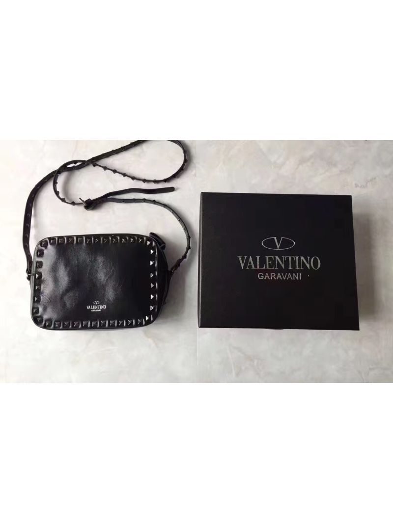 Valentino Garavani Rockstud Rolling Noir Cross Body Bag with craquelé effect. 