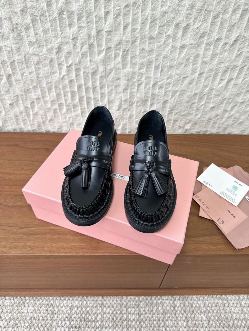 Miu Miu Tassel Loafers in Polished Leather 5D497E Black