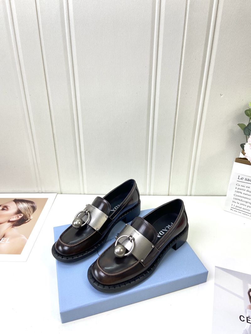 PRADA BRUSHED LEATHER LOAFERS WITH METAL DETAILS 1D981N TOFFEE